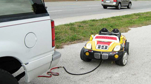 Deputies: Drunk Grandparents Tow Girl in Toy Car Behind SUV