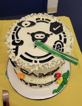 Camp CryptoBot themed cake top view